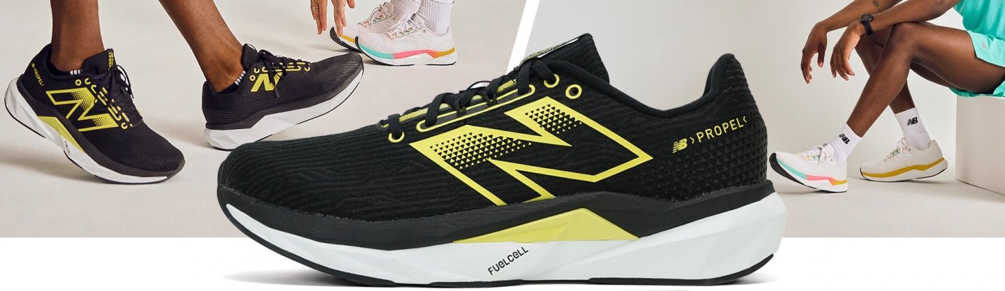 New Balance FuelCell Propel V5 running shoe in black and yellow, shown from lateral side with FuelCell midsole detail.