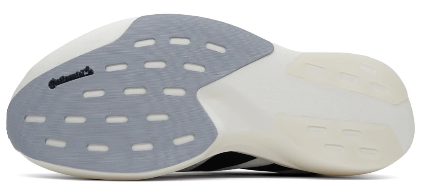 Bottom view of Adidas Adizero Evo SL running shoe showing Continental rubber outsole with flex grooves