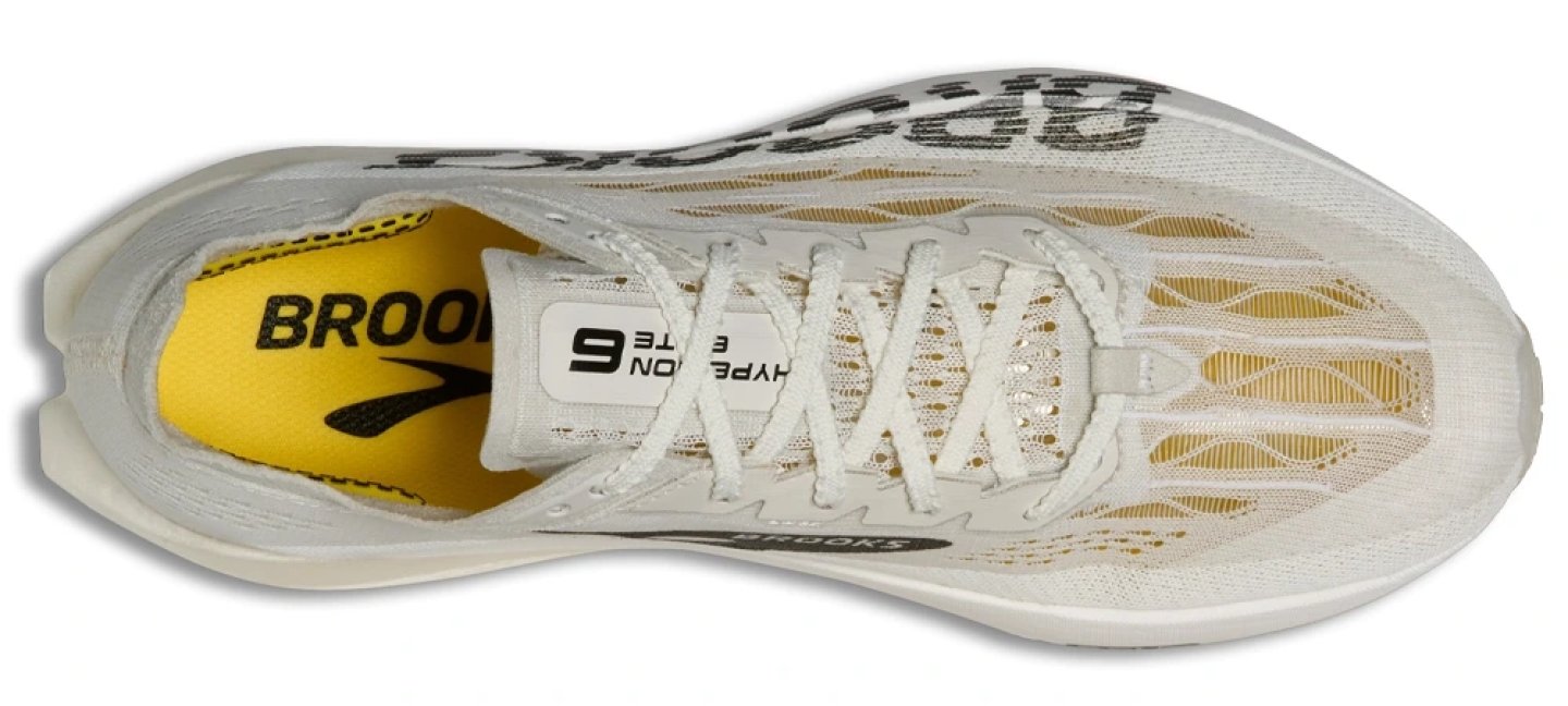 Brooks Hyperion Elite 6 running shoe top view, white mesh upper with gold detailing and yellow Brooks insole visible