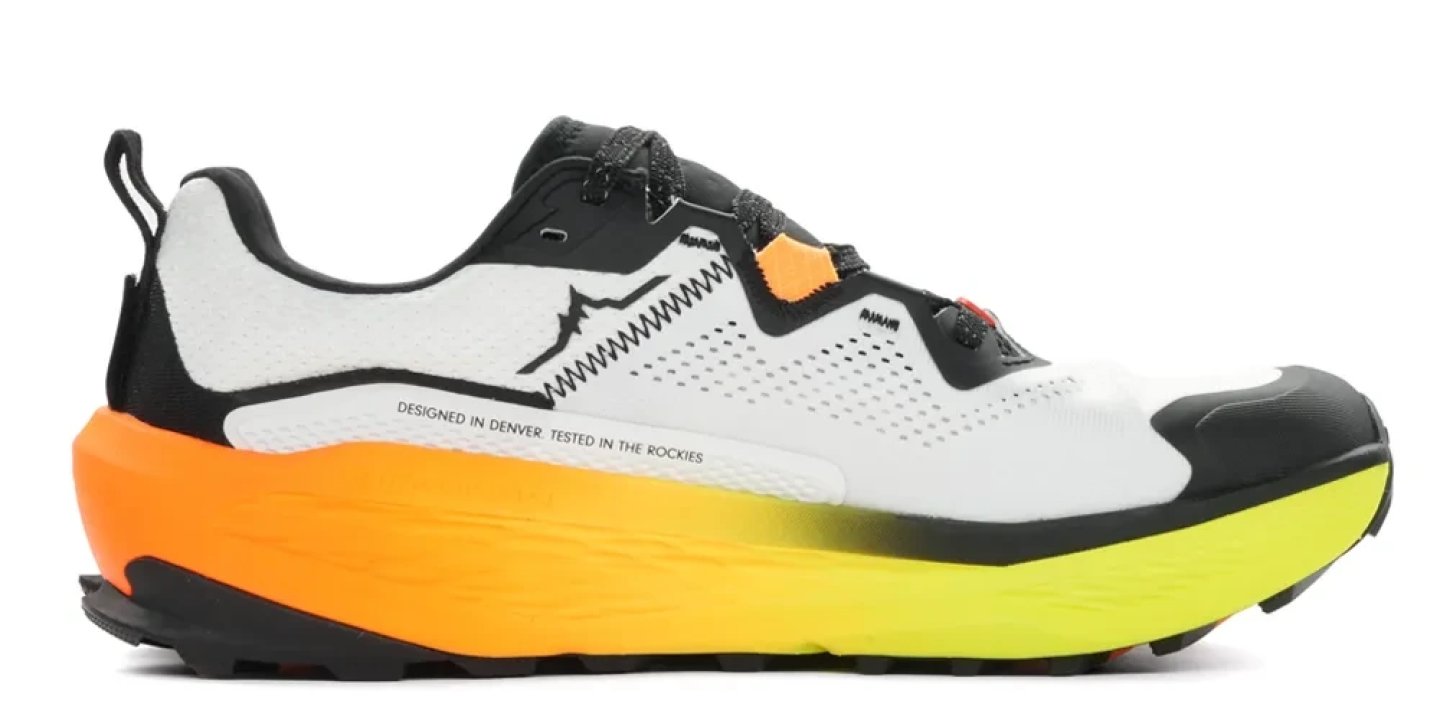 Altra Olympus 7 trail running shoe in white with orange-to-neon-yellow gradient midsole and black toe cap, lateral view