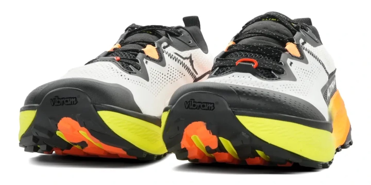 Altra Olympus 7 trail running shoes rear view showing Vibram outsole with yellow, orange and black lugs