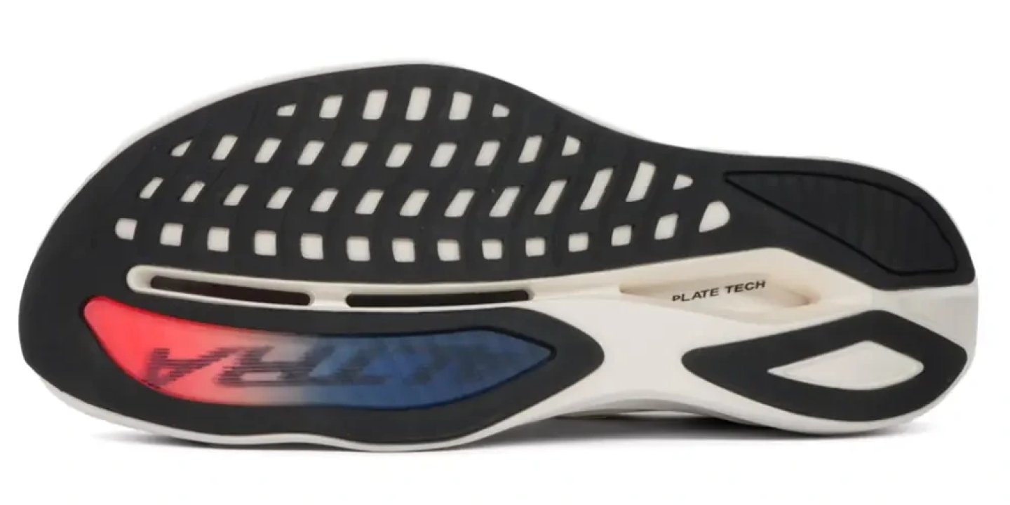 Bottom view of Altra Vanish Carbon 3 Women's shoe showing carbon plate, rubber outsole grid, and heel traction pods