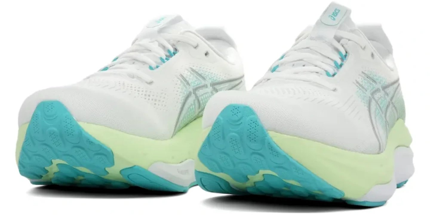 Rear view of ASICS Gel-Kayano 33 running shoes in white with teal and lime green midsole detailing