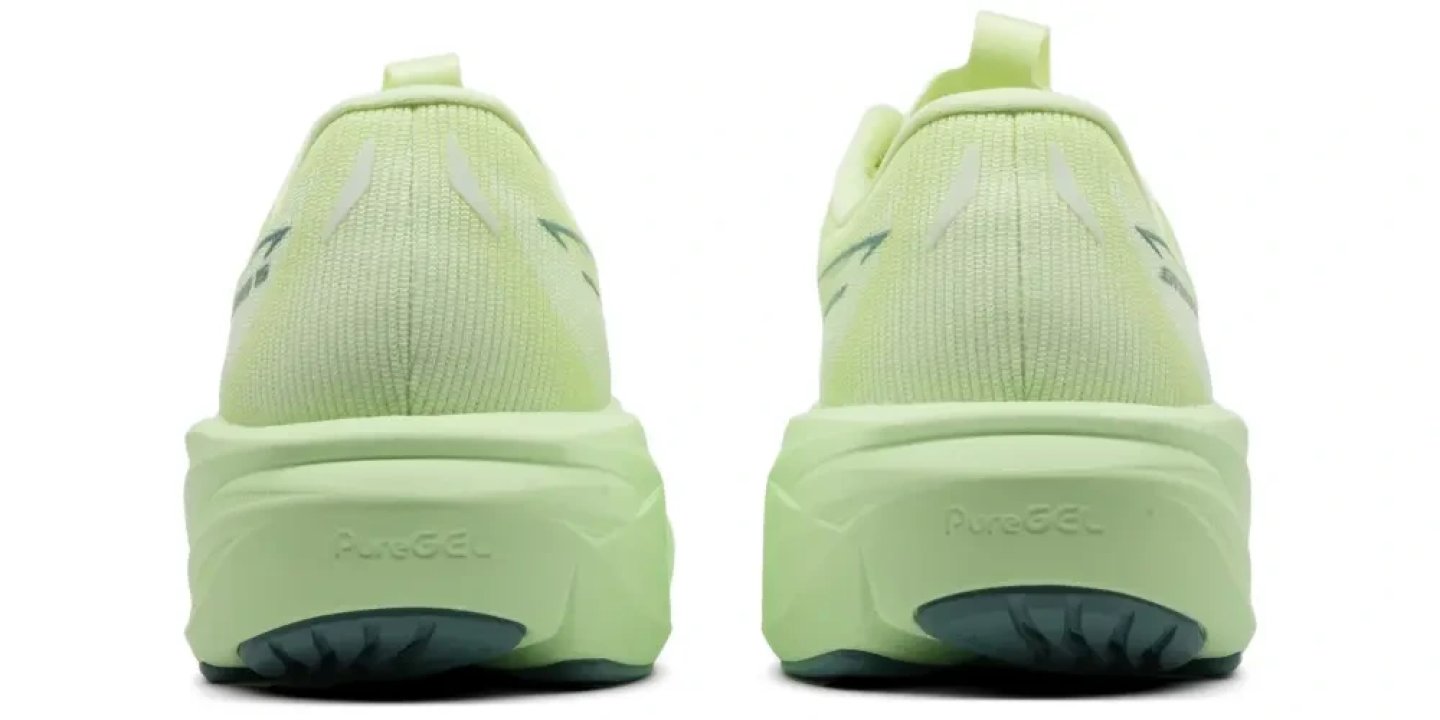Rear view of two Asics GT-2000 15 running shoes in lime green, showing PureGEL midsole and ribbed mesh upper.