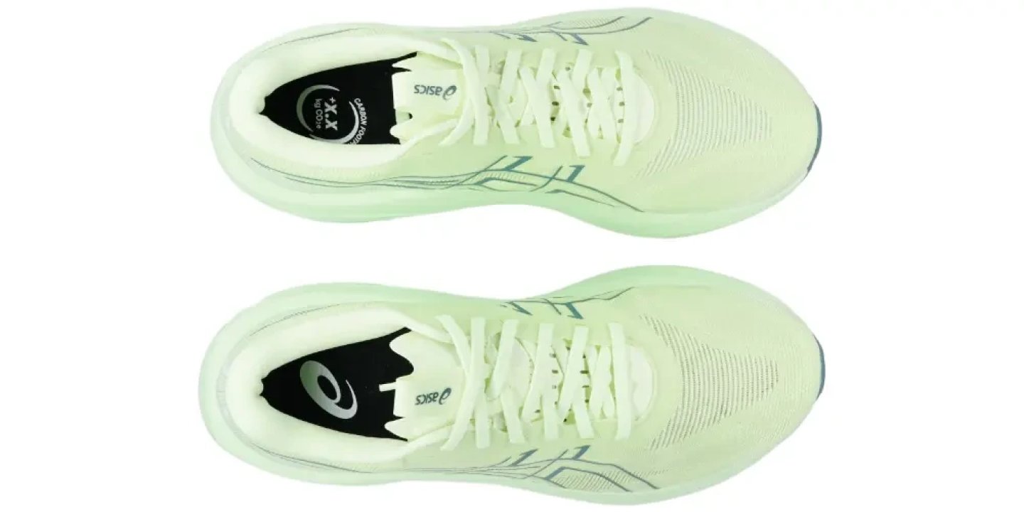Top view of Asics GT-2000 15 running shoes in mint green, showing engineered mesh upper, teal Stripe logo and lace system.