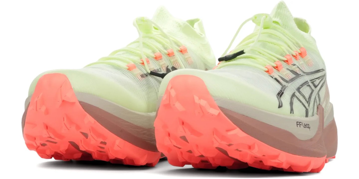 ASICS Metafuji Trail 2 trail running shoes in lime green and coral, rear three-quarter view showing FF Leap midsole and lugged outsole
