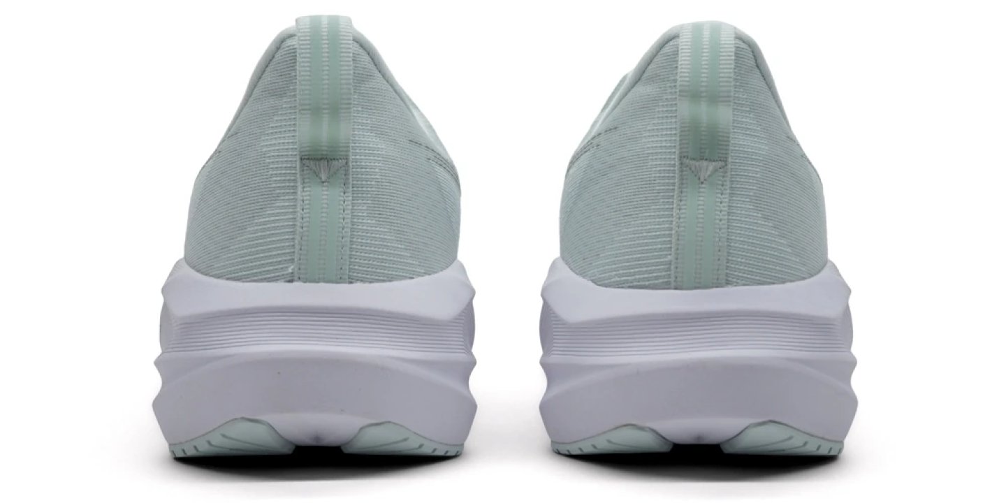 Rear view of a pair of Asics Novablast 5 running shoes in mint green with a white stacked midsole