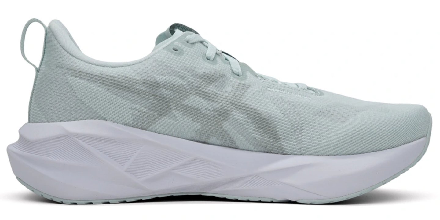 Asics Novablast 5 running shoe in pale mint green, medial side view, showing mesh upper and white foam midsole.