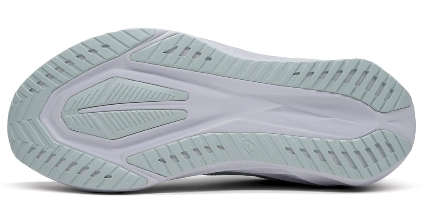 Bottom view of Asics Novablast 5 running shoe outsole showing light blue rubber tread pattern, flex grooves and midfoot cutouts