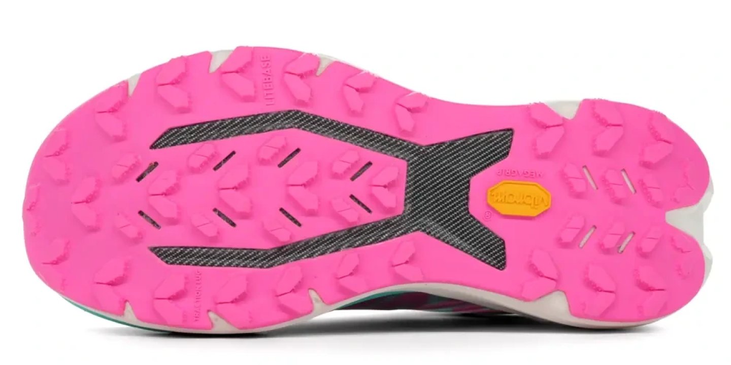 Bottom view of Dynafit Ultra DNA 2 trail running shoe showing pink Pomoca rubber outsole with multidirectional lugs
