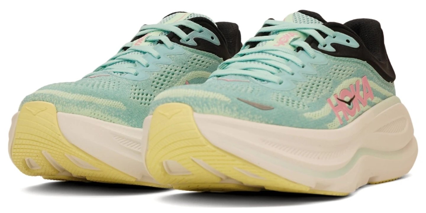Hoka Bondi 9 running shoes in mint green and yellow with black heel collar, shown from a front three-quarter angle