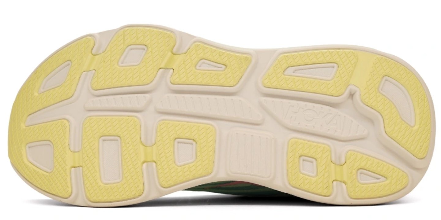 Bottom view of Hoka Bondi 9 Zool showing yellow and cream segmented rubber outsole with flex grooves and rocker profile.