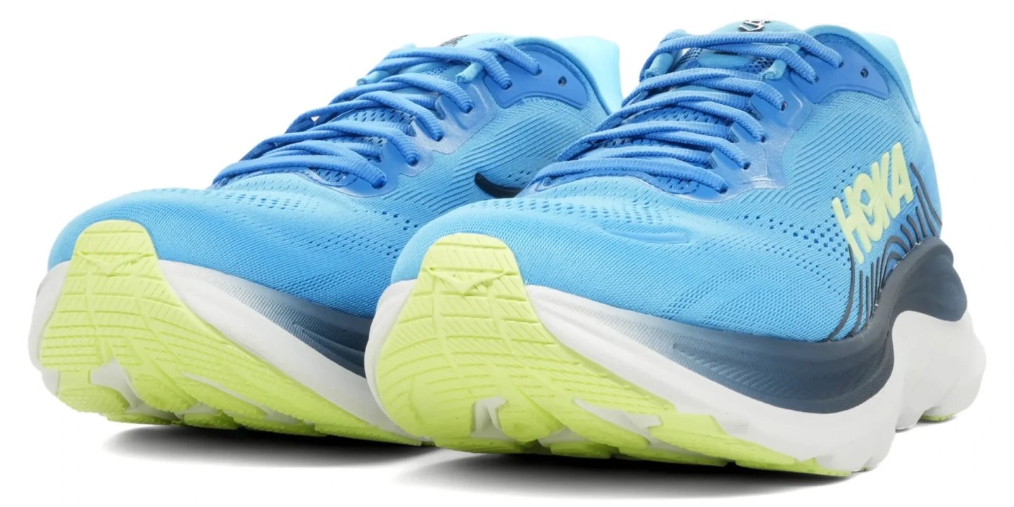 Pair of Hoka Clifton 11 running shoes in blue and lime green colorway, shown from a rear three-quarter angle