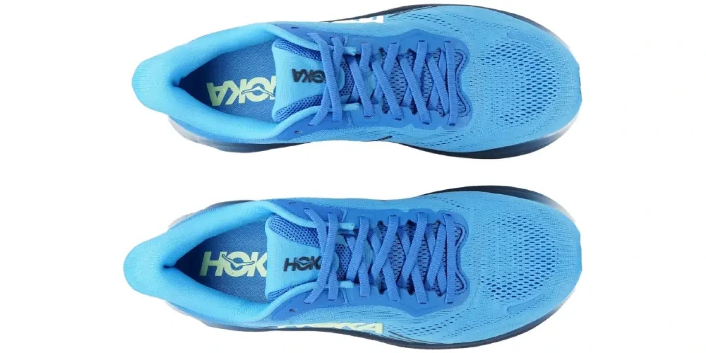 Top view of Hoka Clifton 11 running shoes in bright blue with blue laces and mesh upper, shown as a pair