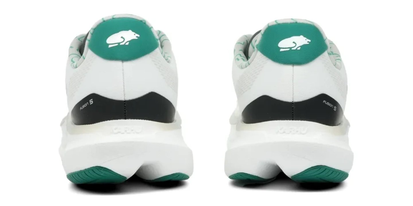 Rear view of two Karhu Fusion 5 running shoes in white with teal heel collar and outsole, white bear logo visible