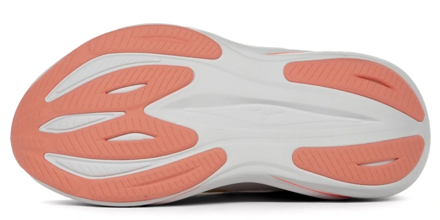Bottom view of Mizuno Sky Prime running shoe outsole with coral rubber traction pods and white midsole cutouts