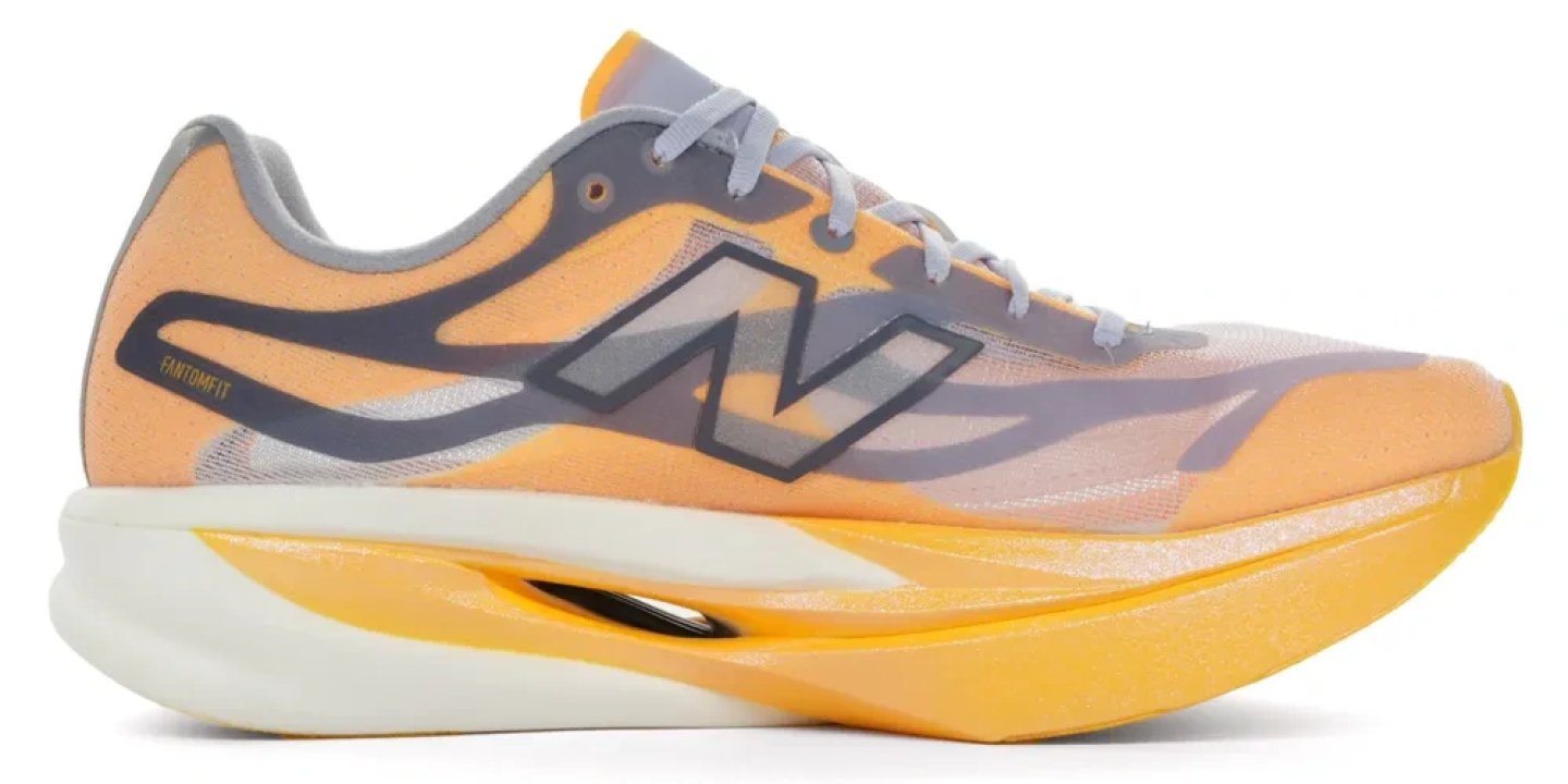 New Balance FuelCell SuperComp Elite v4 in orange and grey, lateral view showing FantomFit upper and rocker midsole