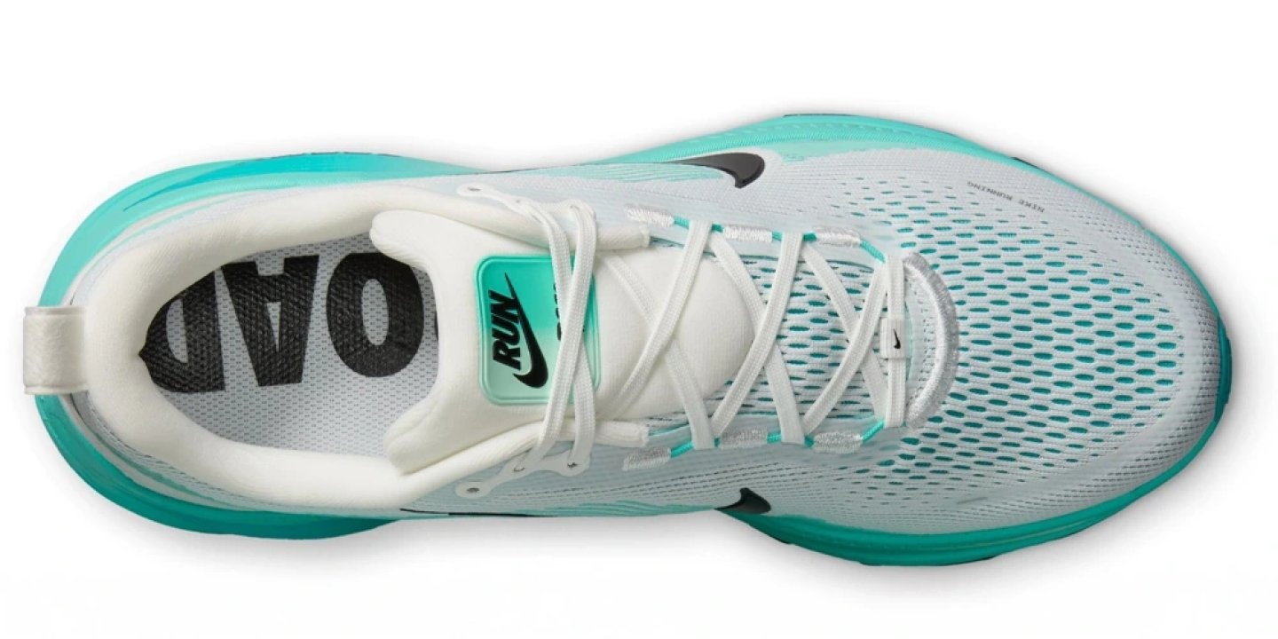 Nike Vomero 18 running shoe top view, white breathable mesh upper with teal accents and black Swoosh logo