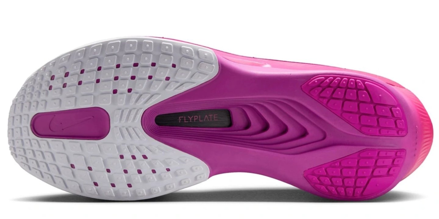 Nike Zoom Fly 6 outsole in pink and white showing FlyPlate carbon plate, heel and forefoot rubber traction zones