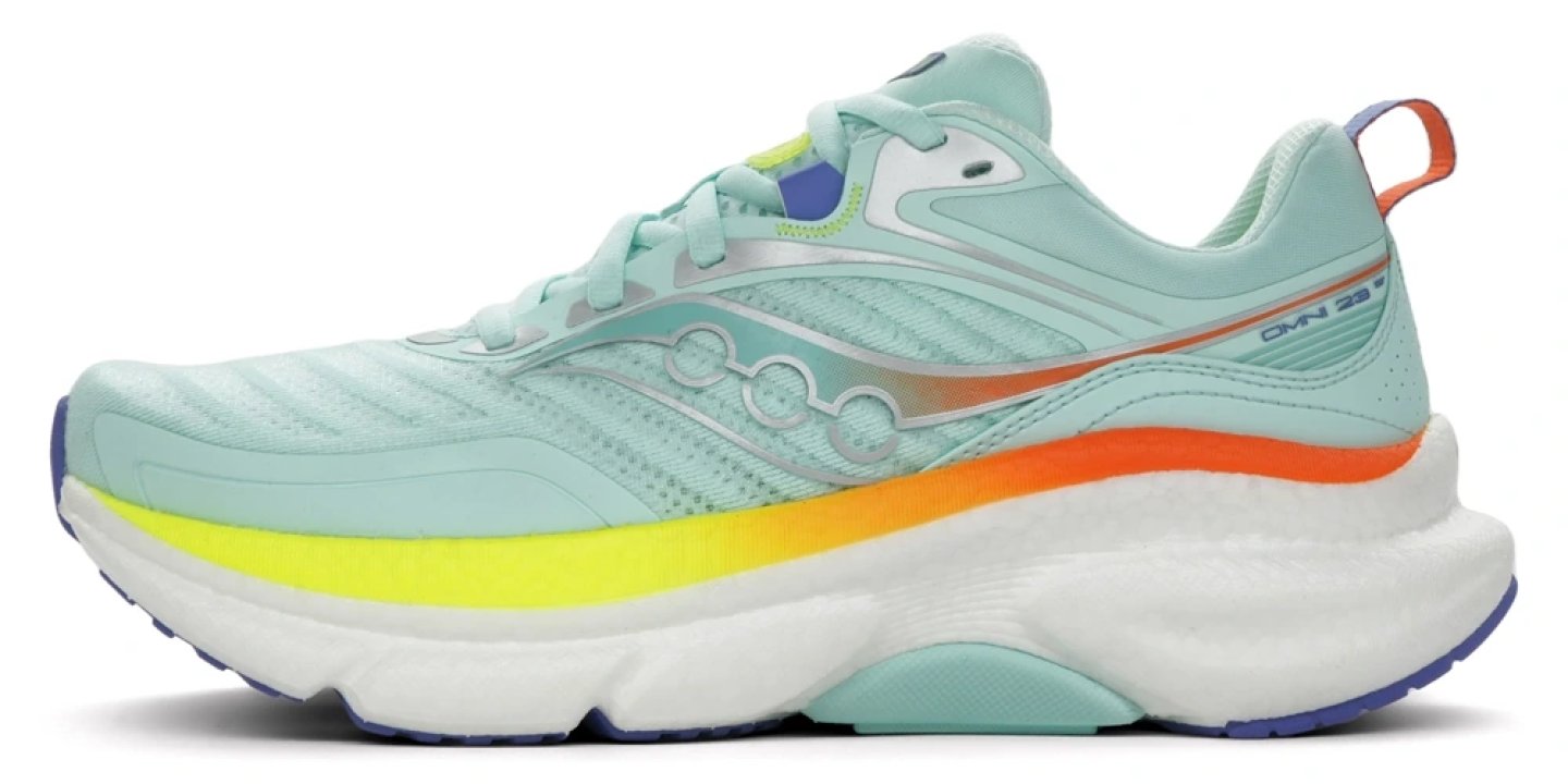 Saucony Omni 23 ST women's running shoe in mint green with yellow, orange and white layered cushioned midsole, lateral view