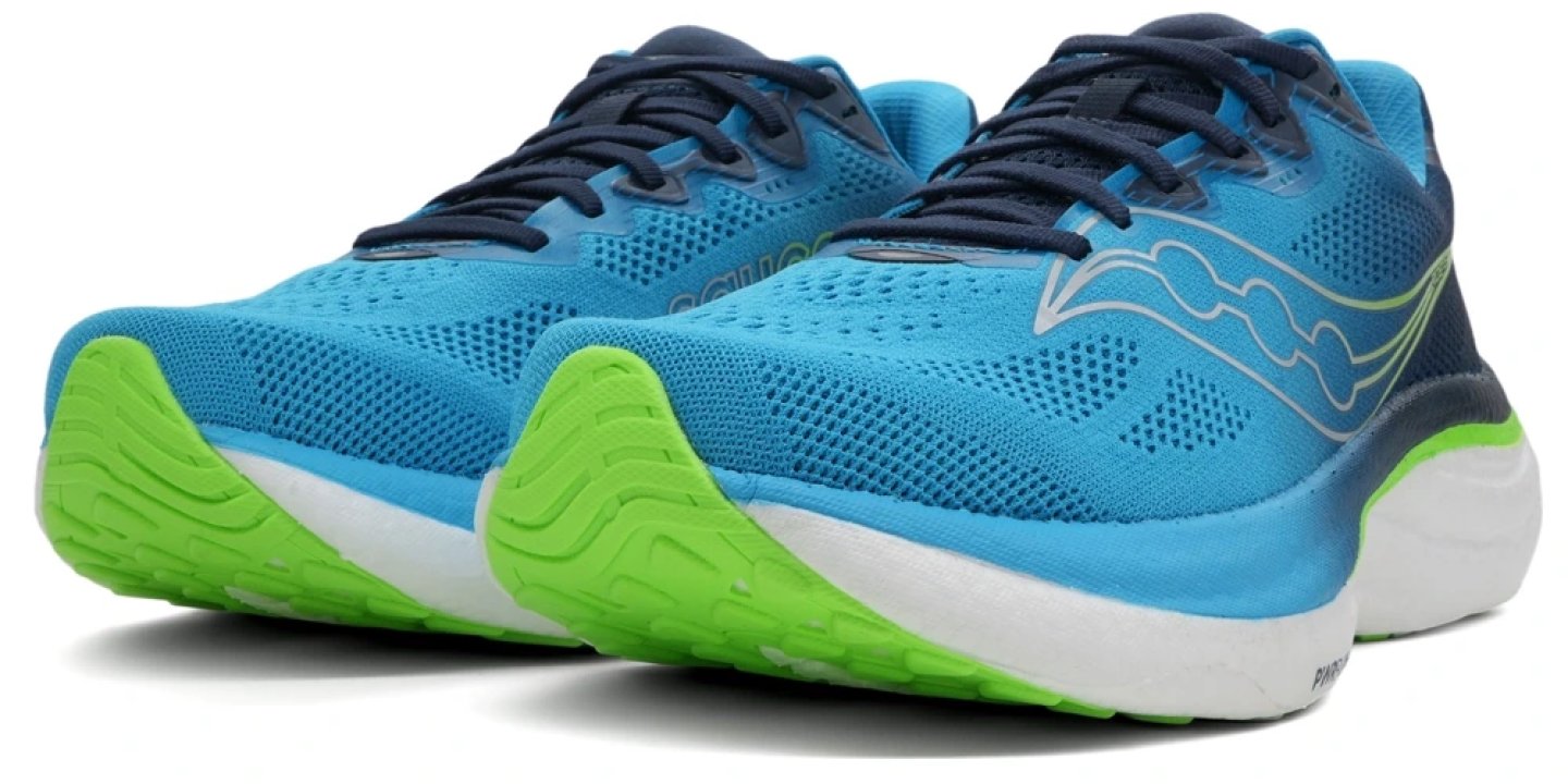 Saucony Ride 19 running shoes in blue and green, front three-quarter view showing mesh upper and cushioned midsole