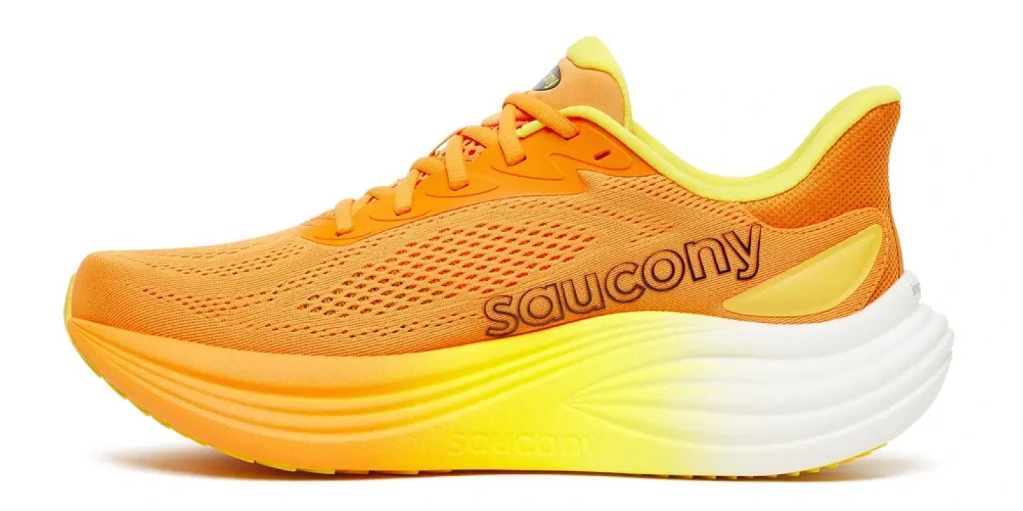 Saucony Triumph 24 running shoe in orange and yellow with a white midsole, shown from the lateral side