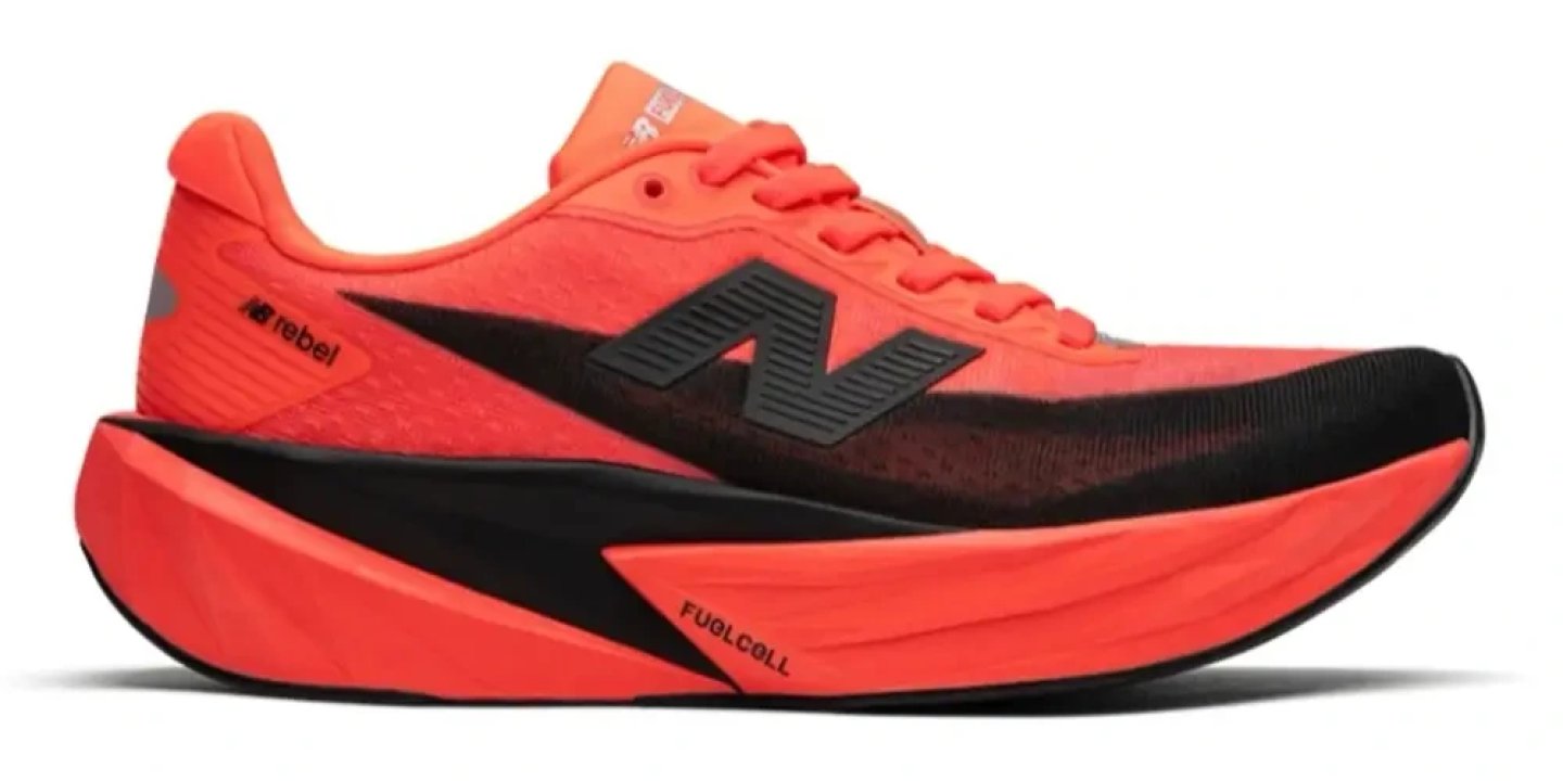 New Balance FuelCell Rebel v5 running shoe in bright orange and black with FuelCell midsole, lateral view