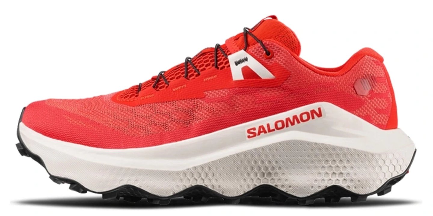 Salomon Ultra Glide 4 trail running shoe in red and white with black lugged outsole, lateral view