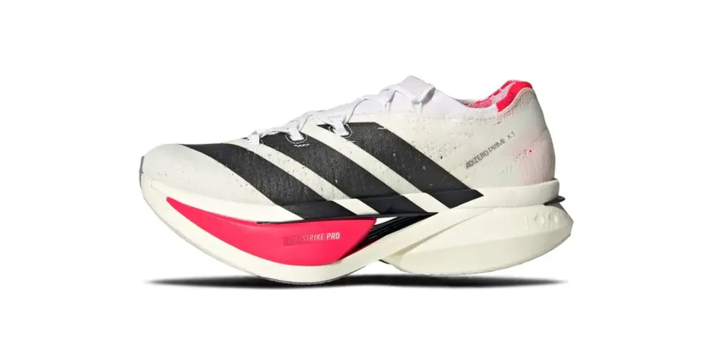 Adidas Adizero Prime X3 running shoe in white and black with pink LIGHTSTRIKE PRO midsole, lateral view.