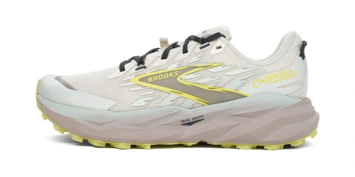 Brooks Cascadia 19 trail running shoe in white and yellow with Trail Adapt outsole, lateral side view
