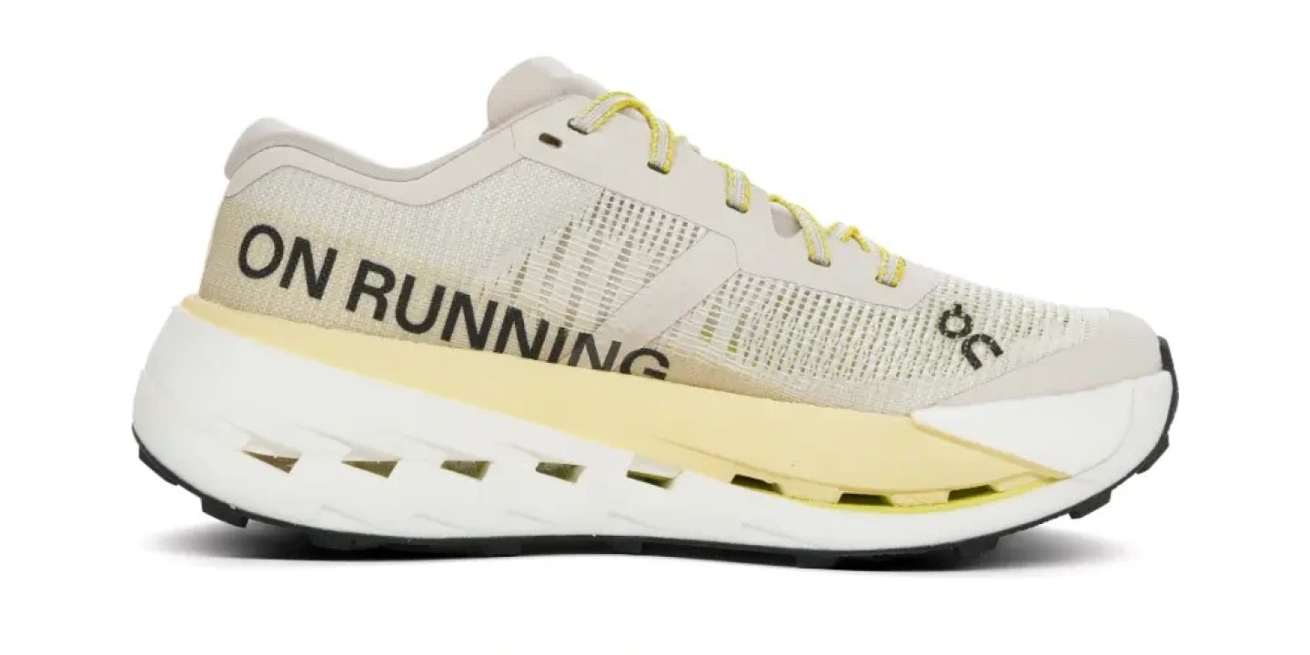 On Cloudultra Pro 3 running shoe in cream and yellow colourway, lateral side view on white background