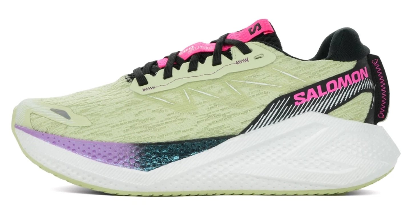 Salomon Aero Glide 4 running shoe in lime green with black overlays, pink branding, and white cushioned midsole, lateral view.