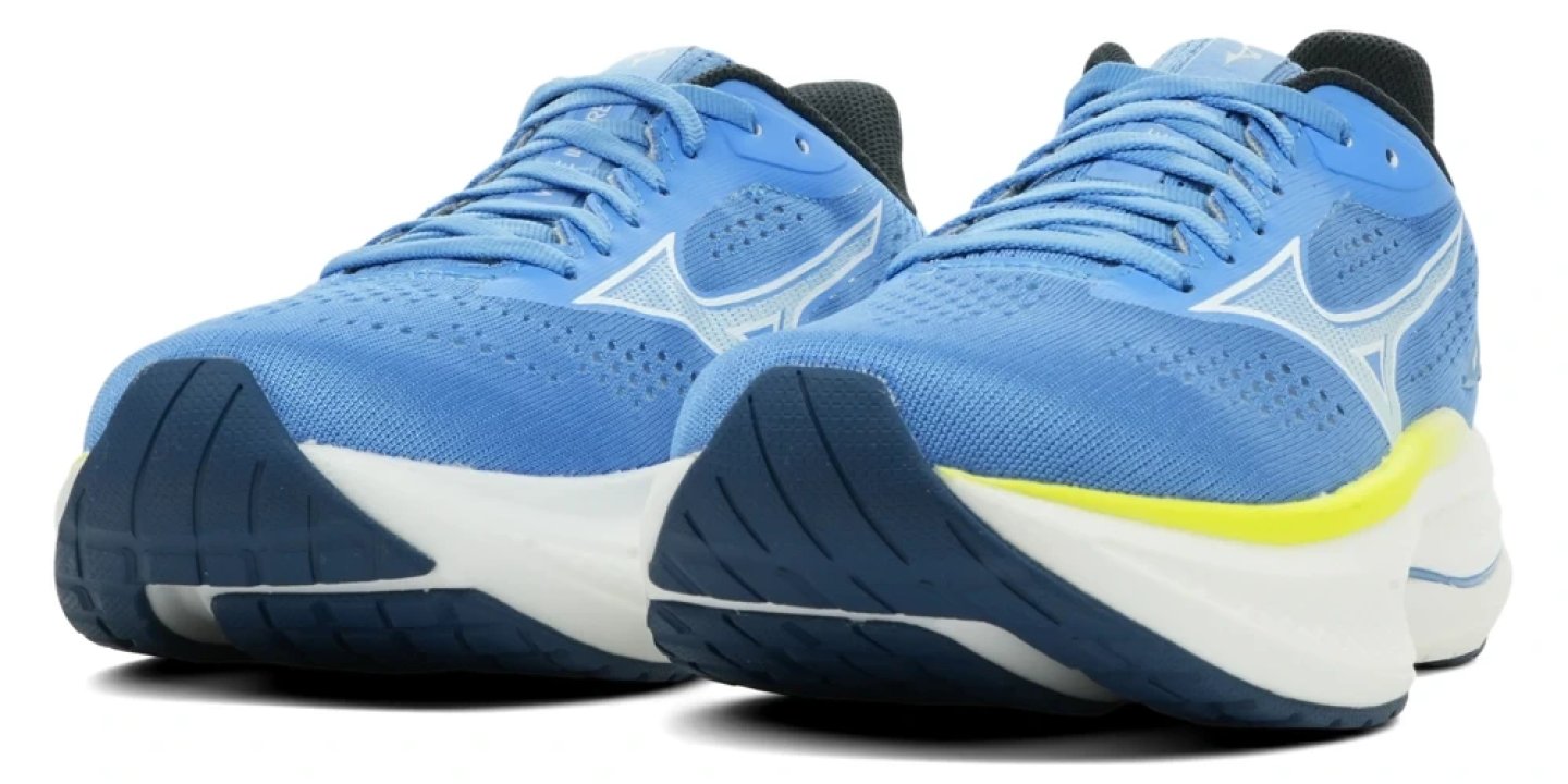 Rear view of two Mizuno Wave Inspire 22 running shoes in blue showing foam midsole, white outsole and yellow heel accent