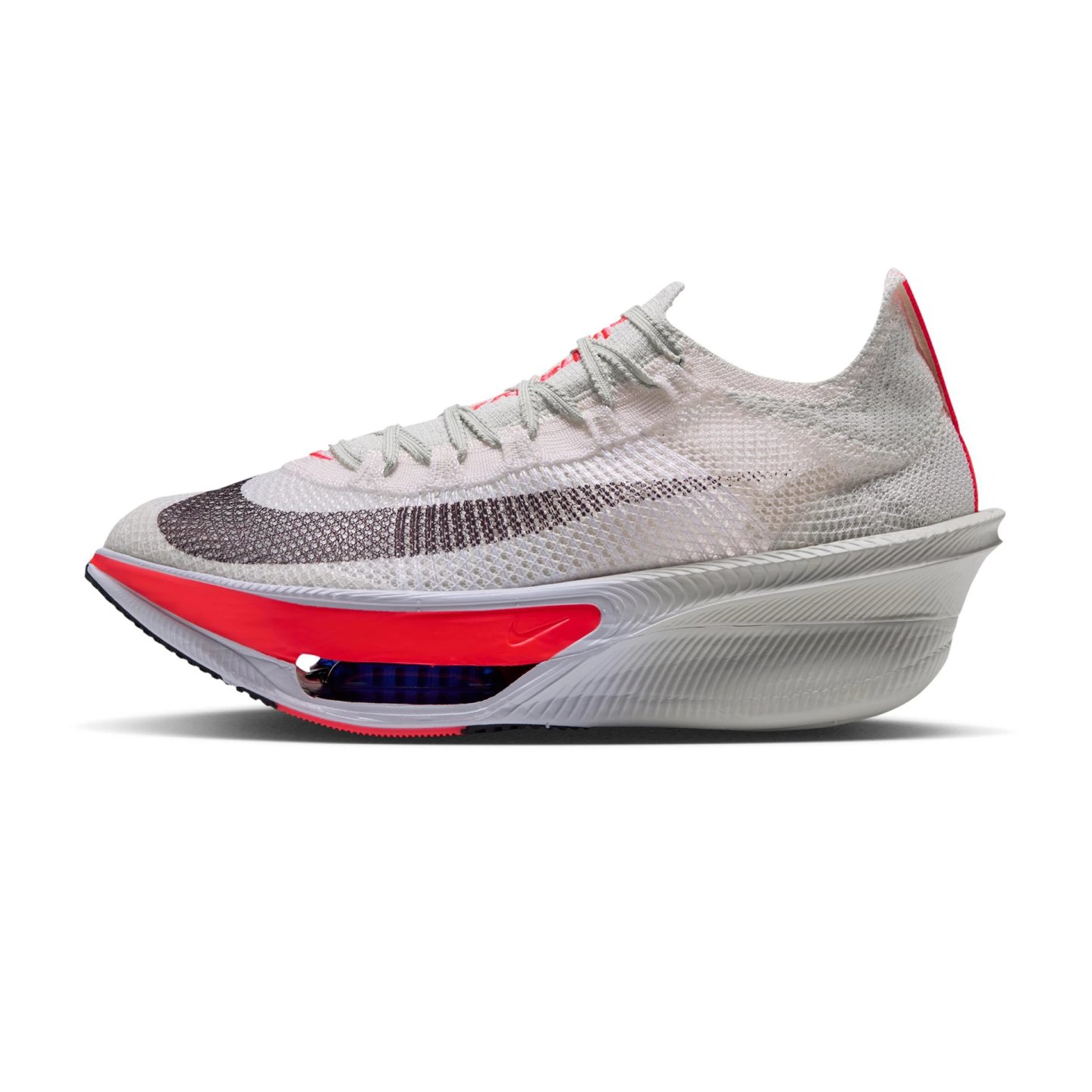 Nike Alphafly 4 running shoe in white, crimson red and blue, lateral side view on white background