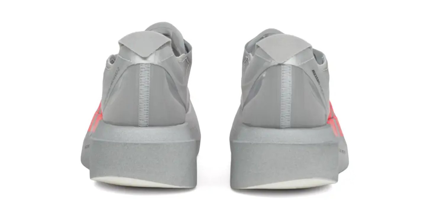 Rear view of the Adidas Adizero Adios Pro Evo 2 running shoe in grey with coral heel branding detail