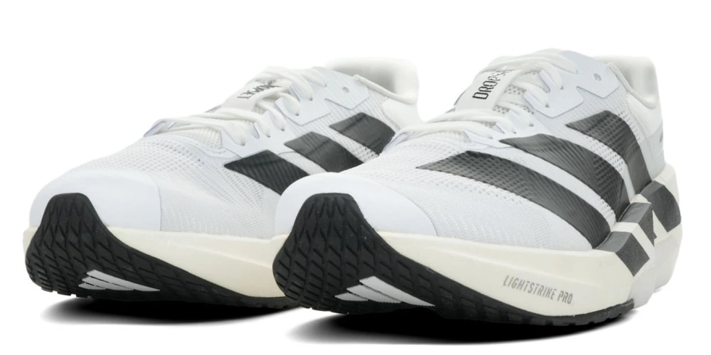 Adidas Adizero Dropset Pro Trainer running shoes in white and black with Lightstrike Pro midsole and three-stripe branding