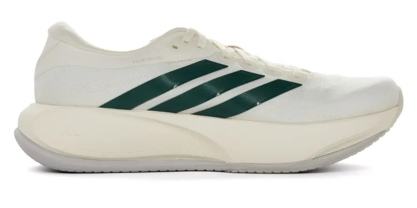 Adidas Supernova Prima 3 running shoe in white and green, lateral view, featuring bold Three Stripes and thick cushioned midsole