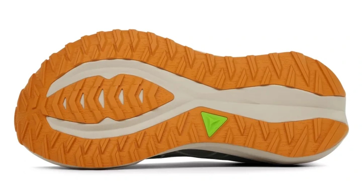Bottom view of the Asics Blazeblast running shoe showing orange rubber outsole with chevron lug traction pattern.