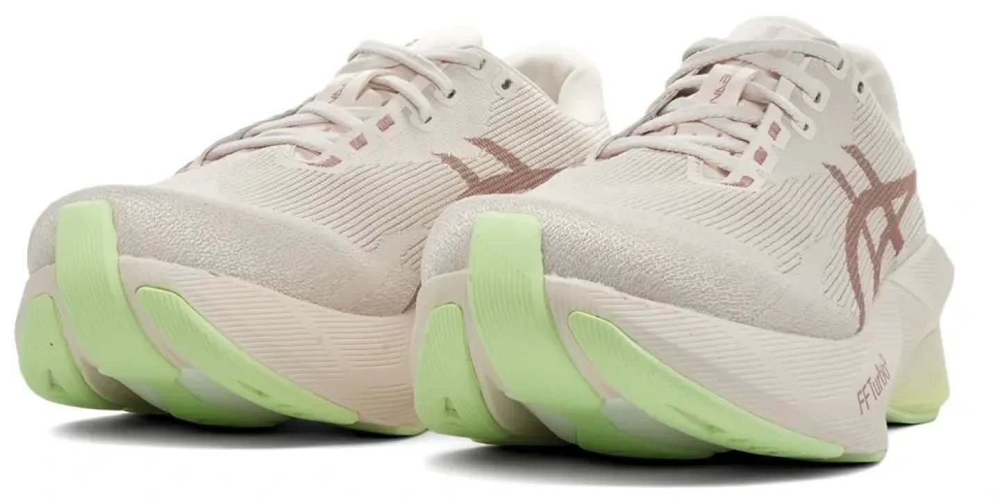 ASICS Novablast 6 running shoes in cream with rose gold logo and lime green FF Turbo+ midsole, rear view