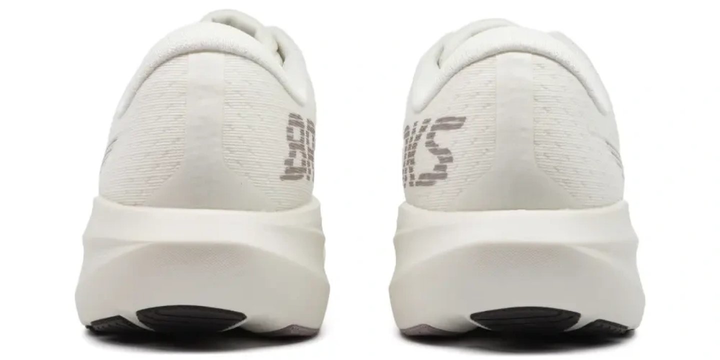 Rear view of Brooks Ghost AMP running shoes in white with grey branding on the heel and black rubber outsole