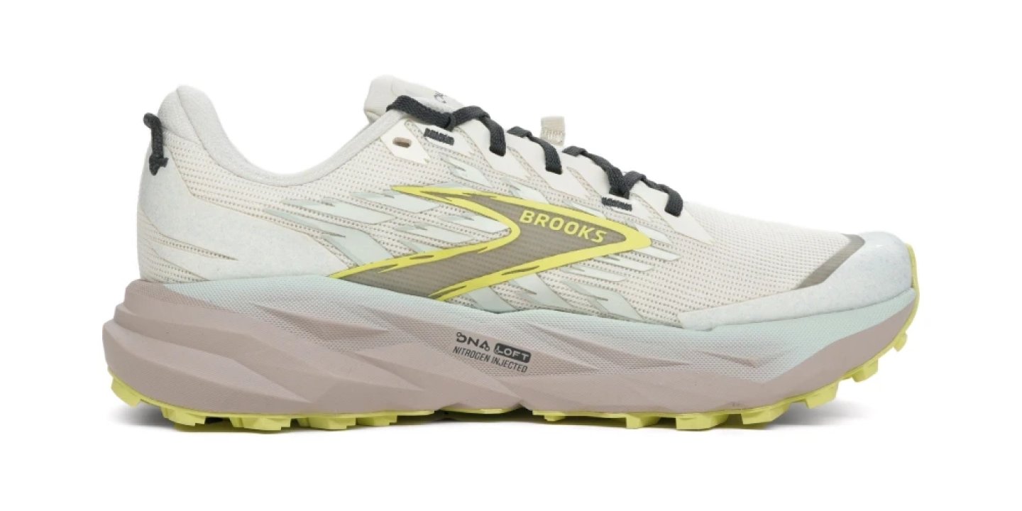 Brooks Caldera 7 trail running shoe in white and yellow with DNA LOFT nitrogen injected midsole and lugged outsole