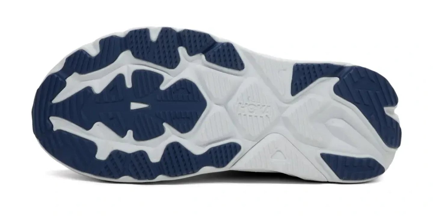 Bottom view of the Hoka Arahi 8 running shoe outsole showing blue and white rubber traction zones