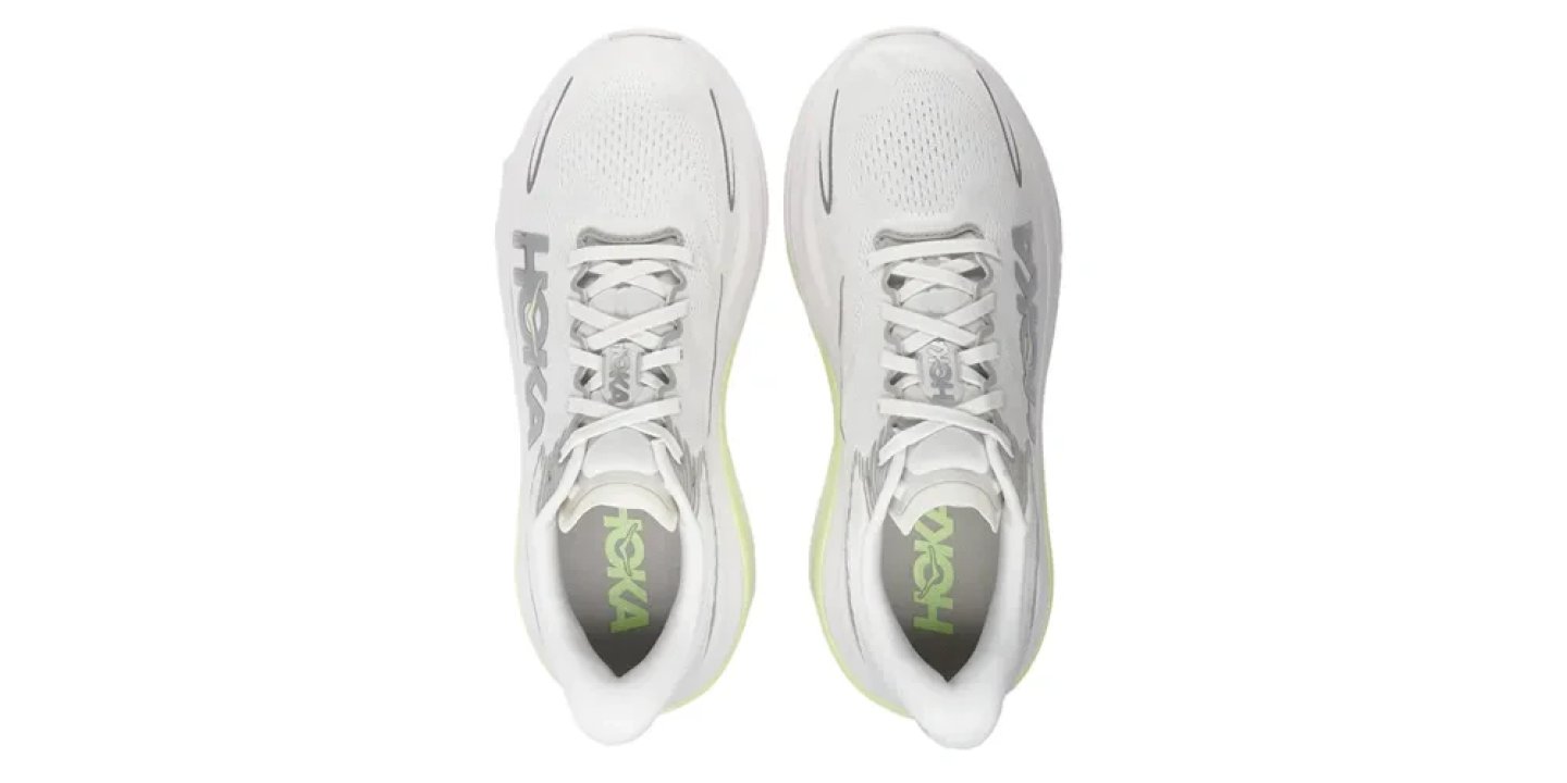 Top view of Hoka Skyward X 2 running shoes in white and silver with lime green midsole and HOKA branding on insole