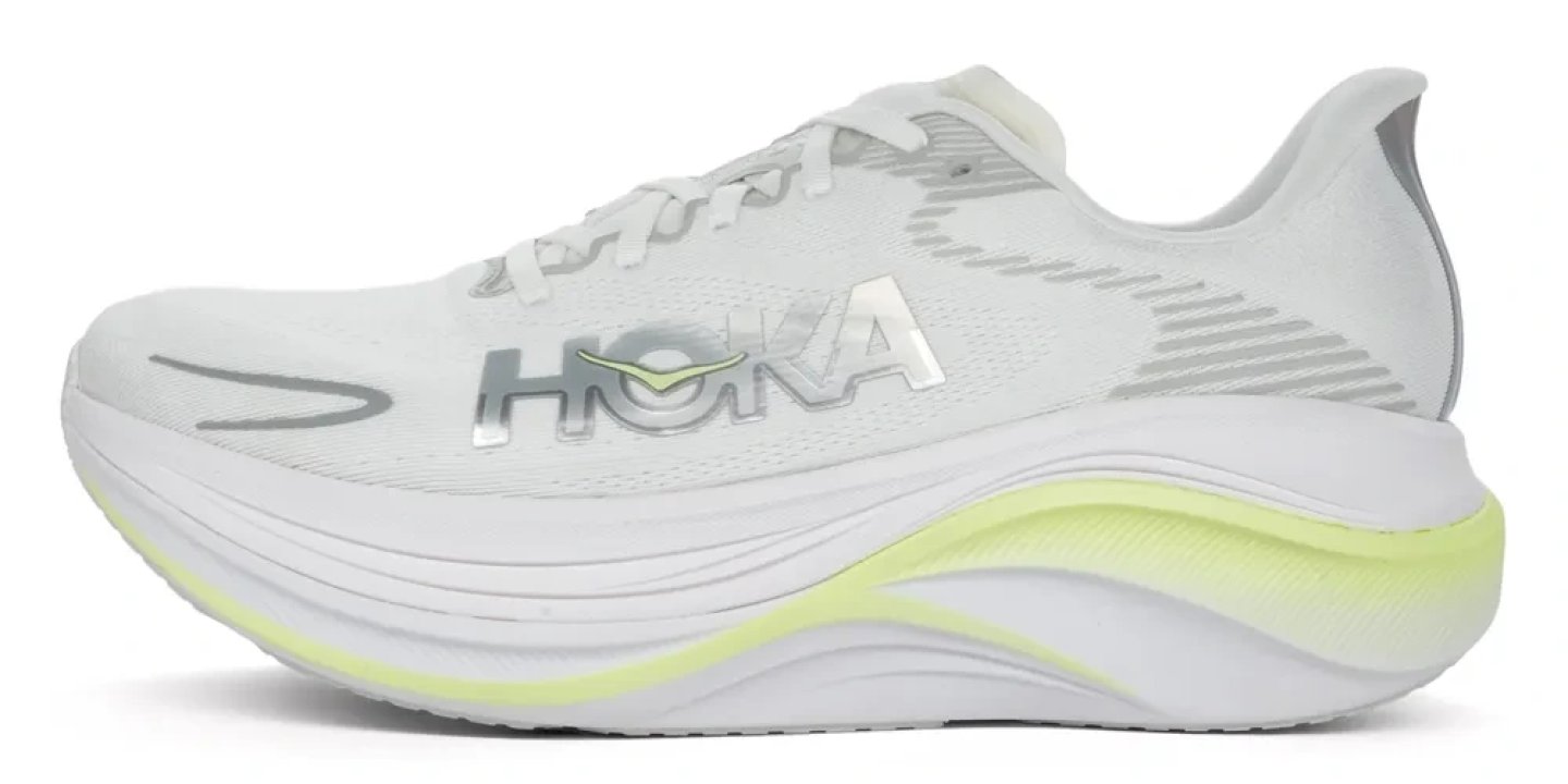 Hoka Skyward X 2 running shoe in white and lime yellow, lateral side view on white background