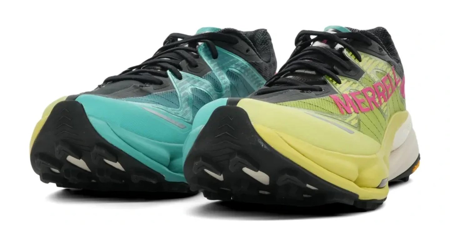Merrell SpeedArc Peak trail running shoes in teal and yellow-green with pink branding and black outsole, pair view
