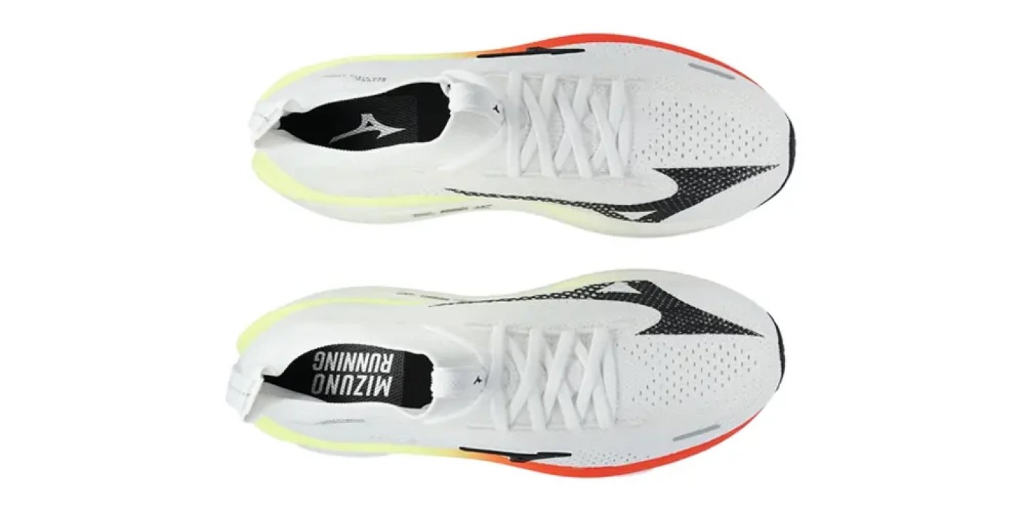 Top-down view of a pair of Mizuno Neo Vista 3 running shoes in white, black, and red with knit upper and cross lacing