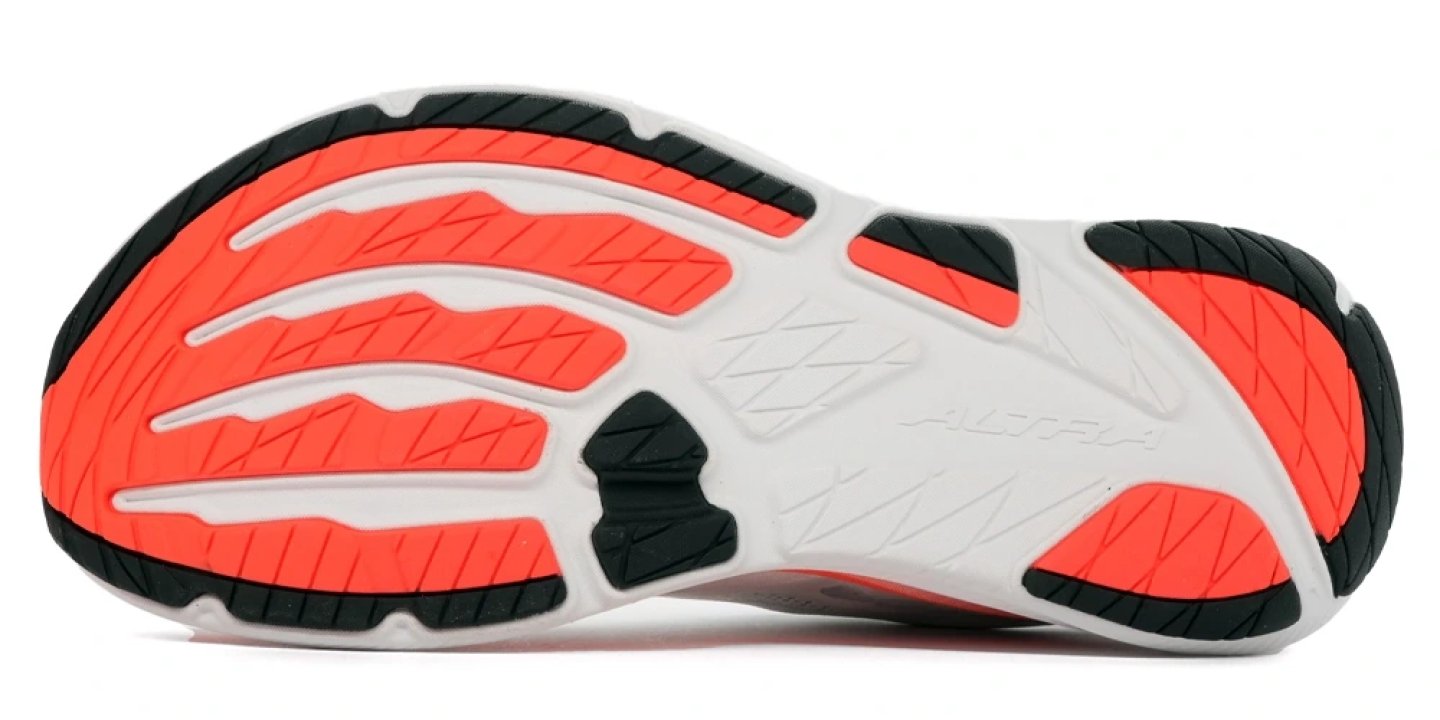 Bottom view of Altra Experience Flow 3 running shoe outsole showing coral rubber traction pods, flex grooves, and white midsole