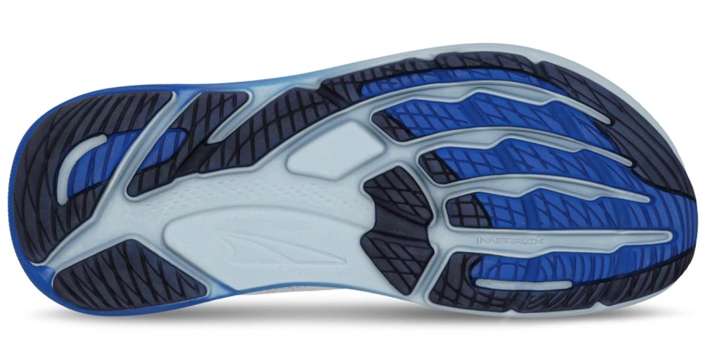 Bottom view of the Altra FWD Via 2 running shoe outsole showing Innerflex grooves, rubber traction lugs, and blue midsole.