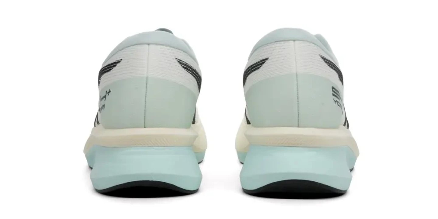 Rear view of Asics running shoes in white and mint blue with a thick cushioned midsole and black rubber outsole