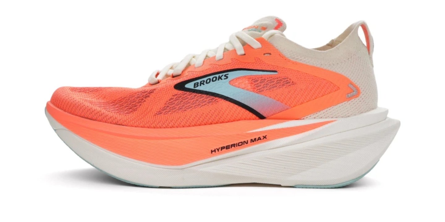Brooks Hyperion Max 3 running shoe in coral orange and white, lateral view showing rocker midsole and mesh upper